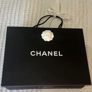 Chanel Black Bag with White Flower Accent